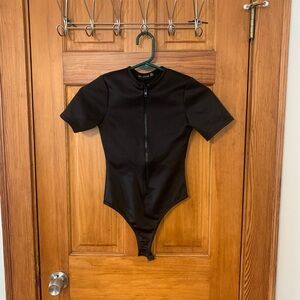 Women’s black zip up bodysuit